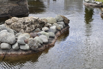 Garden pond. Pond in landscape design.