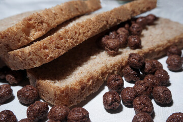 Fresh bread on the table close-up. Healthy eating and the concept.