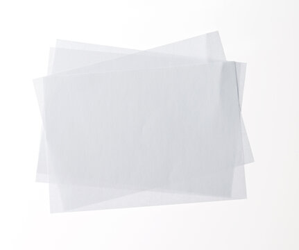 Stack of white papers on white background