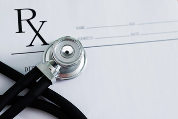 Closeup of stethoscope on rx prescription