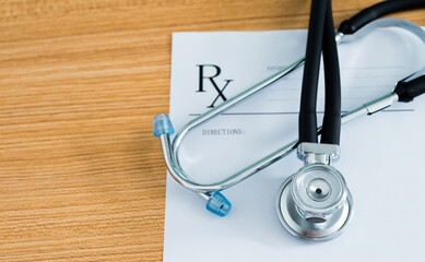 Closeup of stethoscope on rx prescription - obrazy, fototapety, plakaty