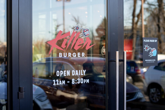 Lake Oswego, OR, USA - Feb 11, 2022: The Killer Burger logo is seen at the entrance to one of its chain restaurants in the Portland metro area in Oregon.