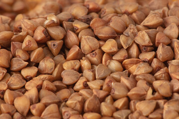 Close-up of buckwheat groats as background.