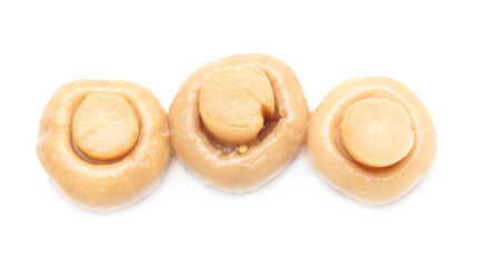 Pickled champignons isolated on a white background.