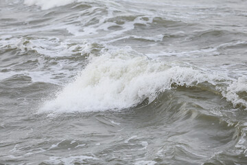 close up baltic sea water vawes texture details near baltic shore.