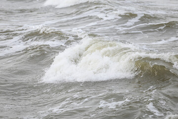 Fototapeta premium close up baltic sea water vawes texture details near baltic shore.