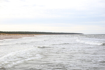 Baltic sea seascape view of shoreline and small waves.