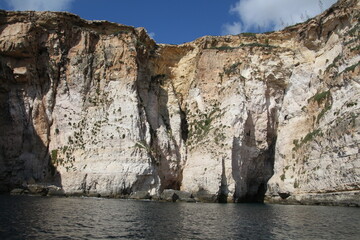 Steep cliffs at the Blue Grotto on the island of Malta