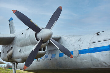 The screw of an old rusty passenger aircraft of the 50s of the 20th century.