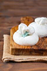 Italian burrata cheese made from mozzarella with cream inside from south italy
