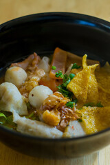 Yentafo noodle with fish meatball 
tofu and dumpling the good tasty food 
in the noodle resturant in Thailand.