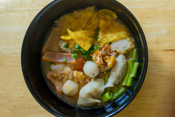 Yentafo noodle with fish meatball 
tofu and dumpling the good tasty food 
in the noodle resturant in Thailand.
