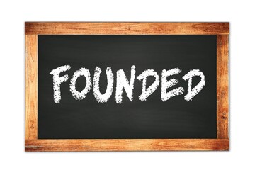 FOUNDED text written on wooden frame school blackboard.