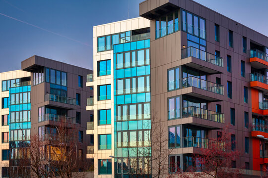 Street with new apartments at sunset in Poland