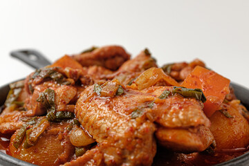 Braised Spicy Chicken on a white background
