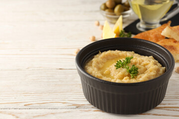 Concept of tasty food with hummus, space for text