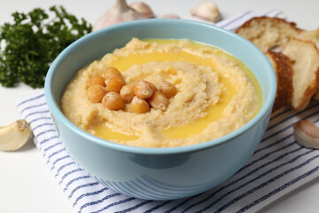 Concept of tasty food with hummus, close up