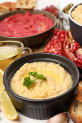 Concept of tasty food with hummus, close up