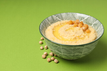 Concept of tasty food with hummus, space for text