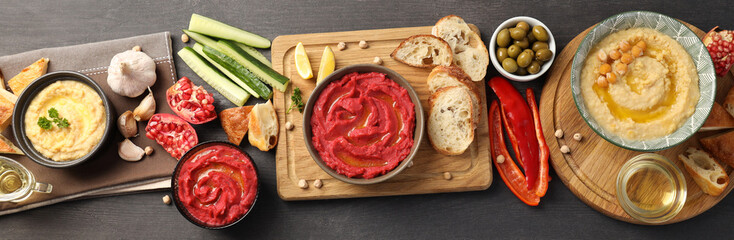 Concept of tasty food with hummus, top view