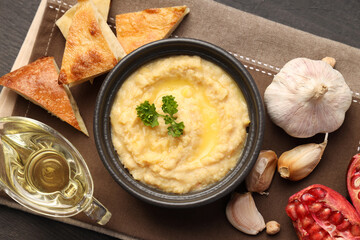 Concept of tasty food with hummus, top view