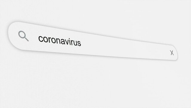 Coronavirus being typed in the search bar. Global pandemic. Web browser. Typing. Screen. Close up
