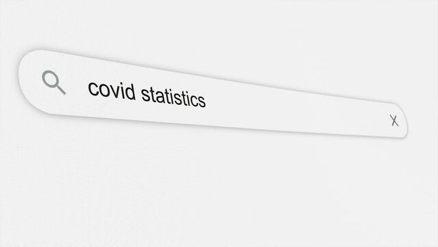 Covid statistics being typed in the search bar. Coronavirus. Global pandemic. Web browser. Typing. Screen. Close up