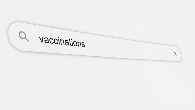 Vaccinations being typed in the search bar. Coronavirus. Global pandemic. Web browser. Typing. Screen. Close up