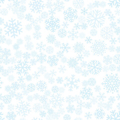 Fototapeta na wymiar Seamless winter background consisting of snowflakes of different shapes placed chaotically. Snowflakes placed on white background. Christmas and new year symbol and mood.