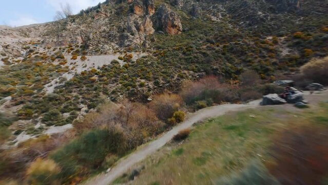 FPV drone flight footage as it dives down two mountains in Andalusia, Spain