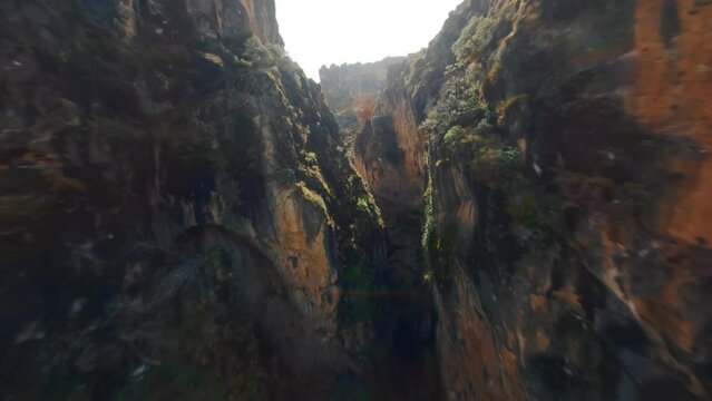 FPV drone flight through a small canyon in Andalusia, Spain