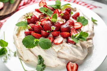 French cuisine. Baked camembert cheese with cranberries and basil leaves, wine on a dark background, banner, menu, recipe place for text