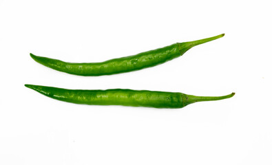 fresh two green chili over on white background