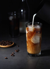 Cold coffee with ice in low key	