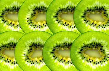 Composition of kiwi slices on a colored background. Postcard, design, background.