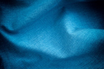 Dark blue crumpled fabric background