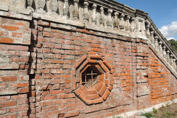 old brick wall with windows