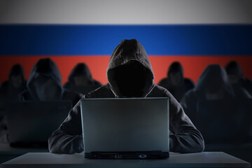 Many russian hackers in troll farm. Cyber crime and security concept. - obrazy, fototapety, plakaty