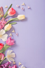Fototapeta na wymiar multicolored spring flowers on purple background