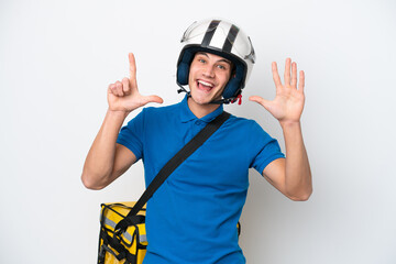 Young caucasian man with thermal backpack isolated on white background counting seven with fingers