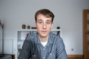 Obraz premium Webcam view of young man. Homeschooling and video call concept