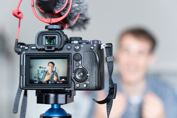 View of the camera recording a man creating content for social media