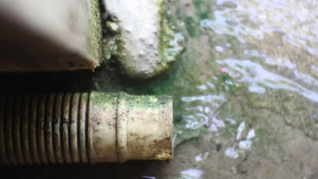 water coming out of washing machine drain pipe