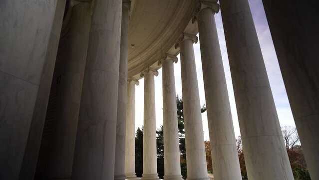 Circle shape building of Thomas Jefferson memorial with marble columns, dolly forward