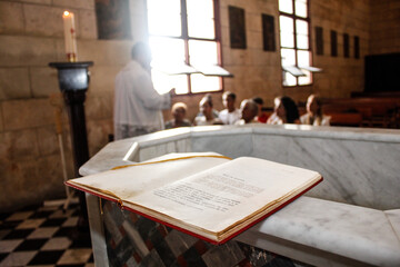 Close up of open bible on altar of a church