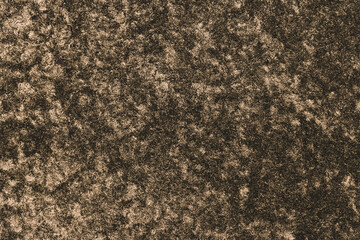 Closeup detail of dark beige leather texture background.