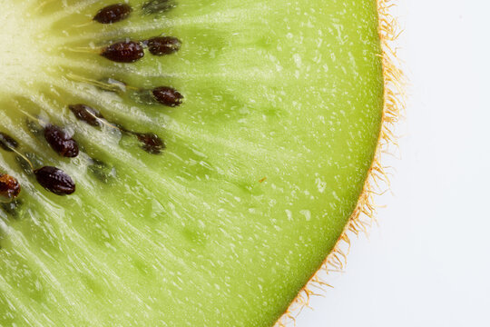 Slice of kiwi fruit, macro shot.