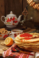 Pancakes with red caviar and samovar tea