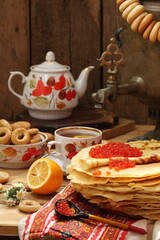 Pancakes with red caviar and samovar tea