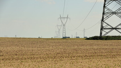 City power poles running across suburban areas